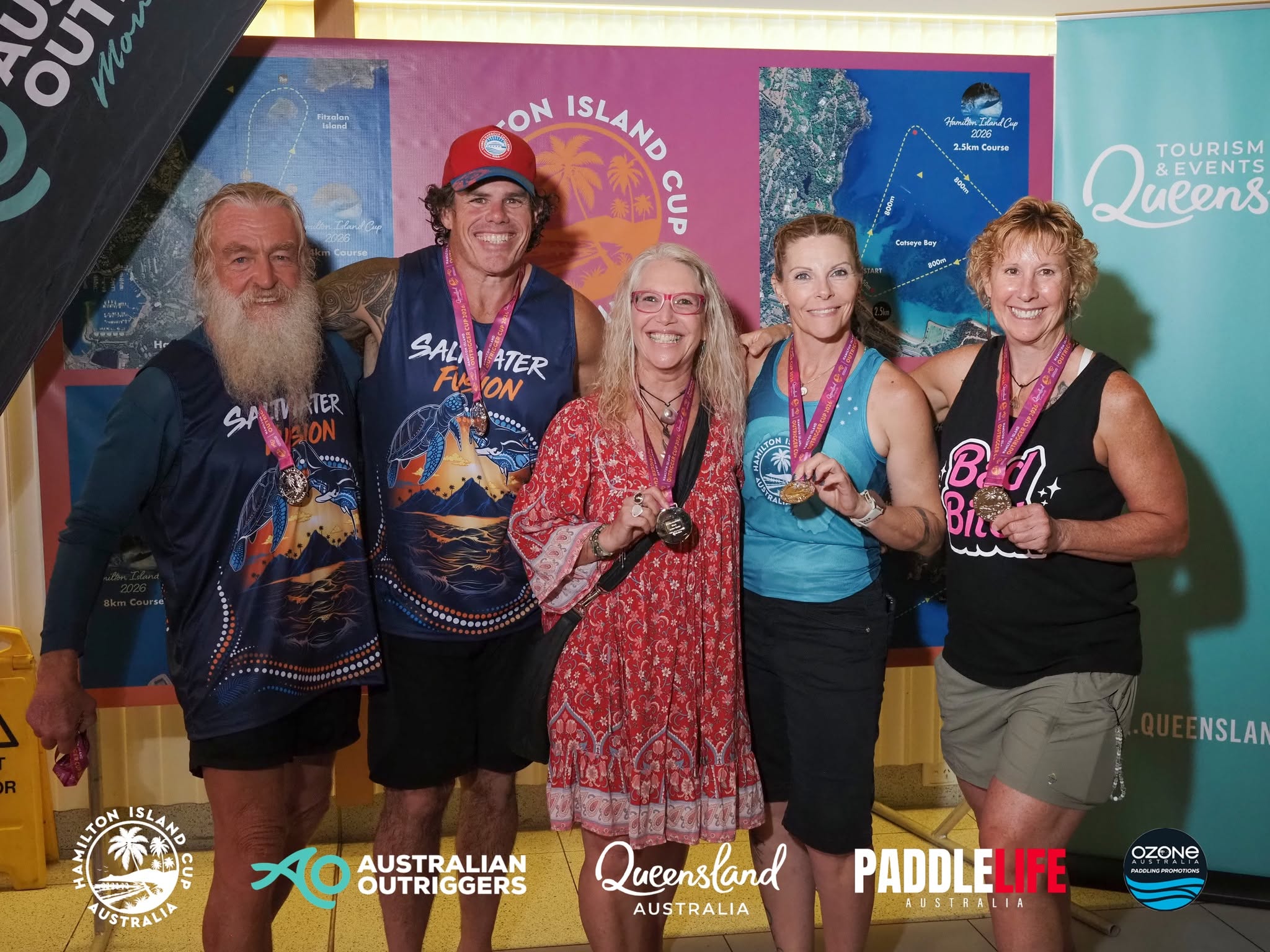 Hamilton Island Cup medal recipients wearing custom event apparel
